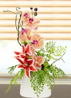 Bezauberndes Orchideen-Gesteck in Vase