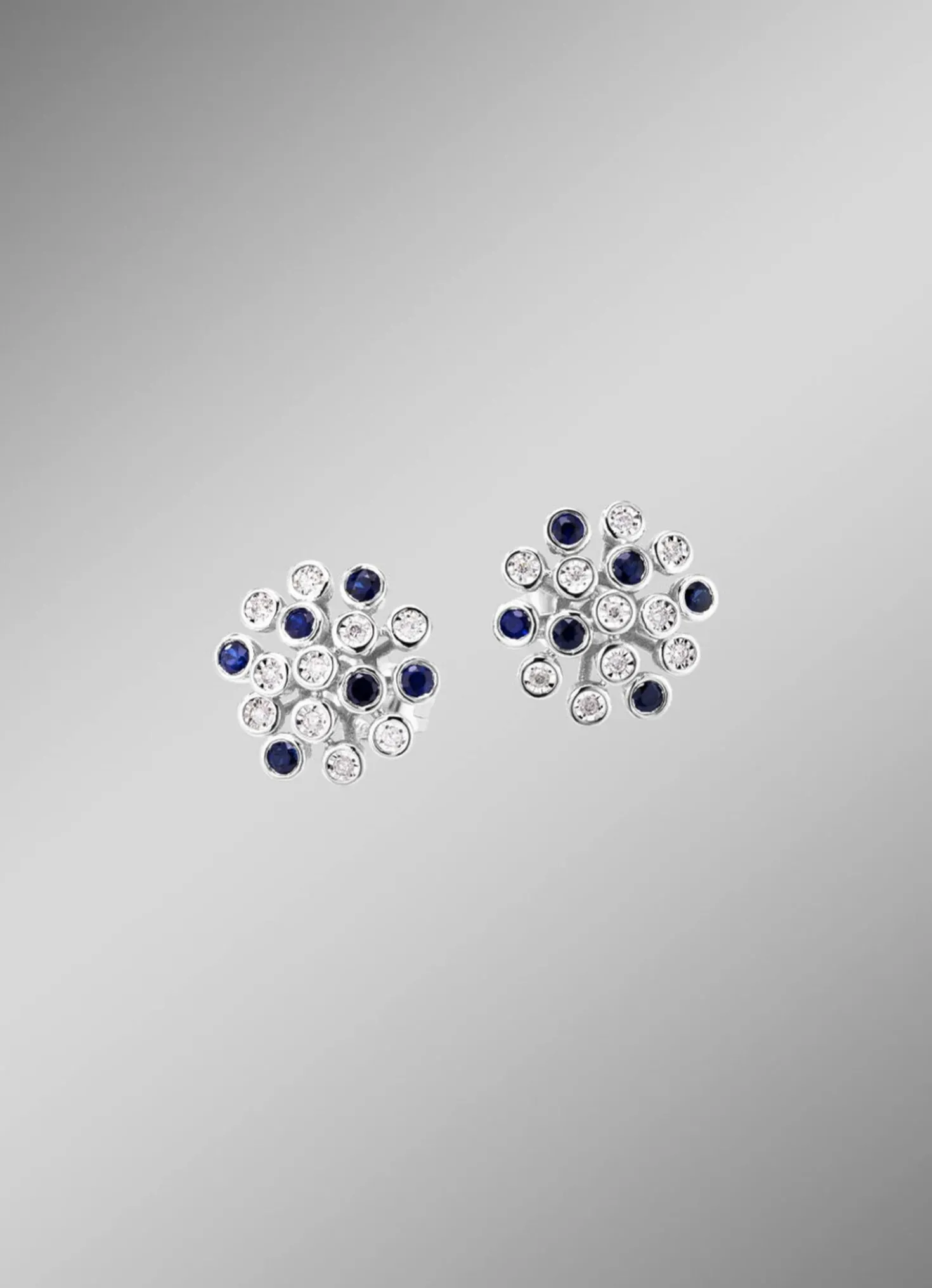 Hochwertige Ohrstecker mit Safir und Brillanten