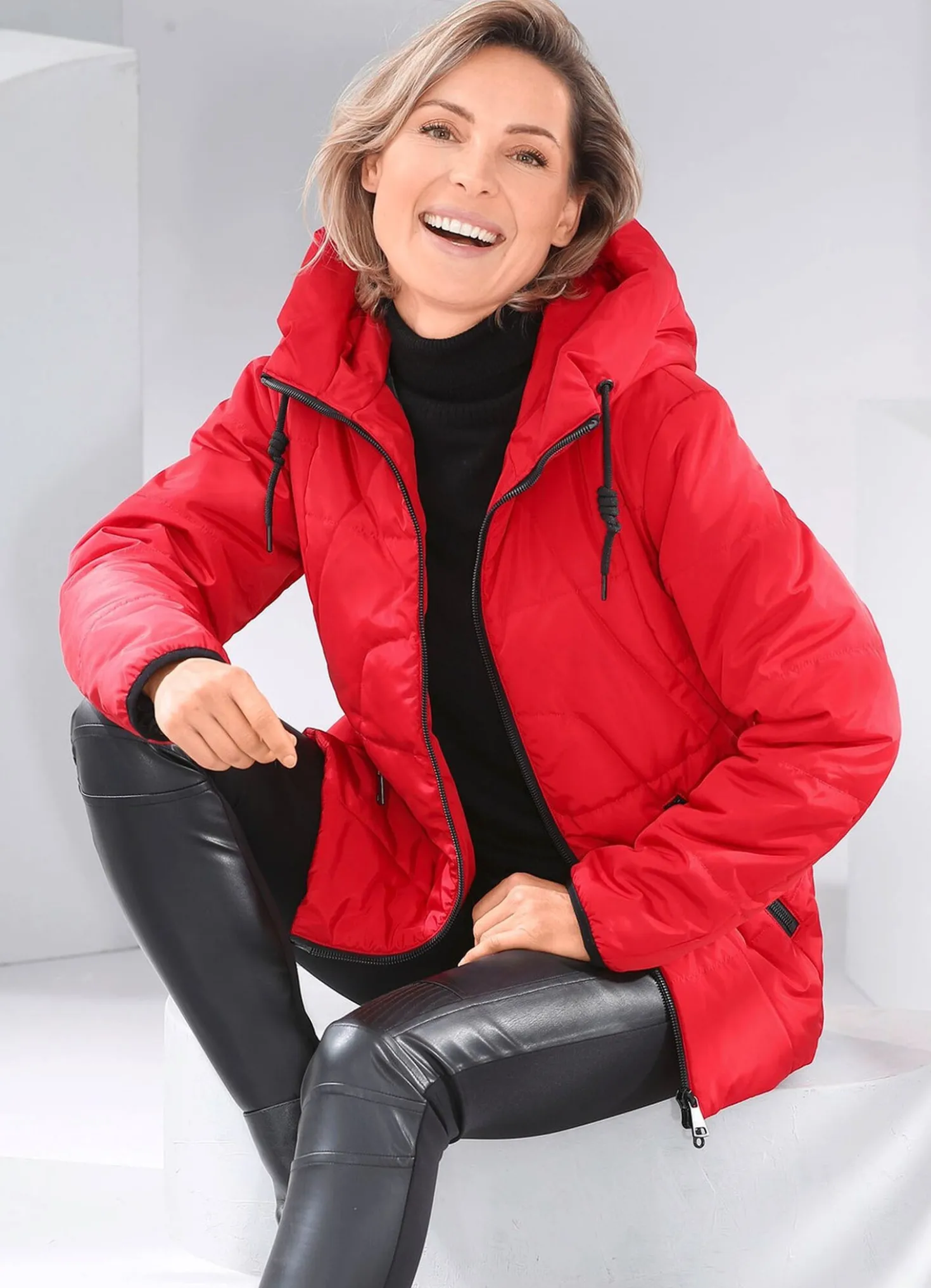 Jacke mit verlängertem Rückteil