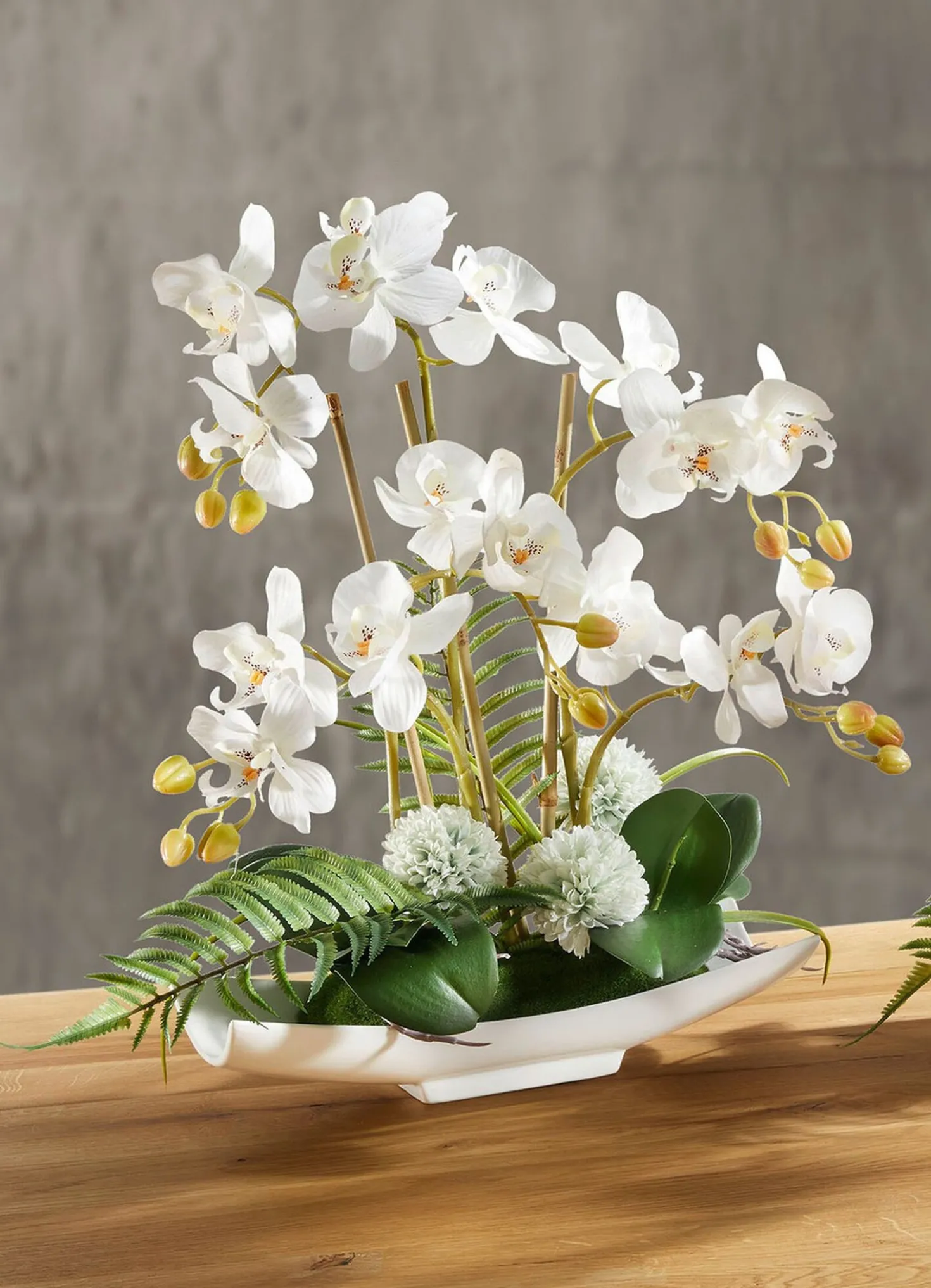 Orchideen-Arrangement in Schale