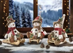 Schneemänner, 3er-Set, auf Schlitten aus Holz