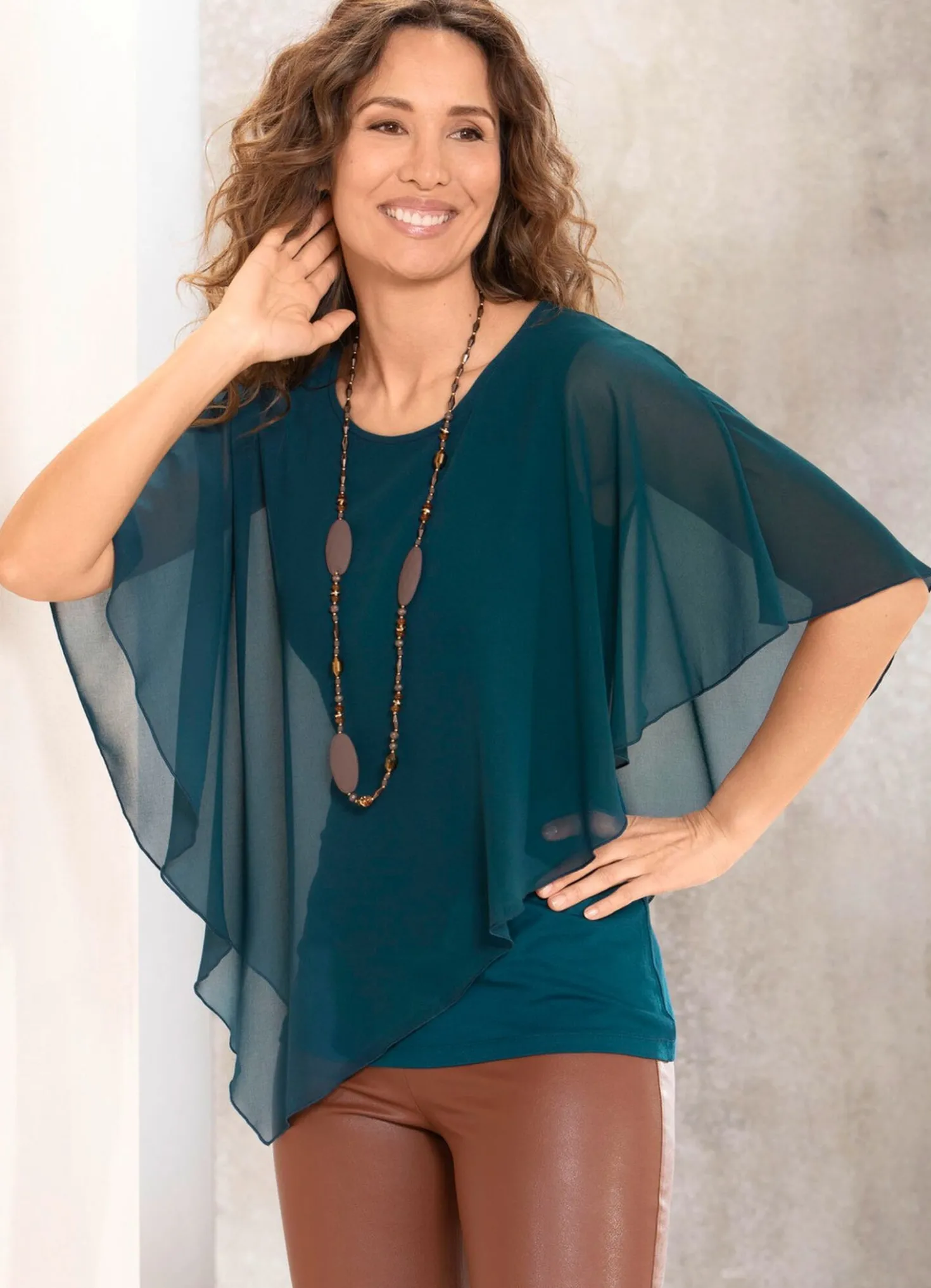 Unifarbene Poncho-Tunika