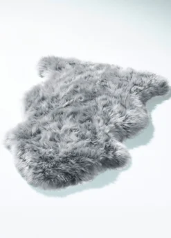 Vorleger aus echtem Lammfell in Tierform